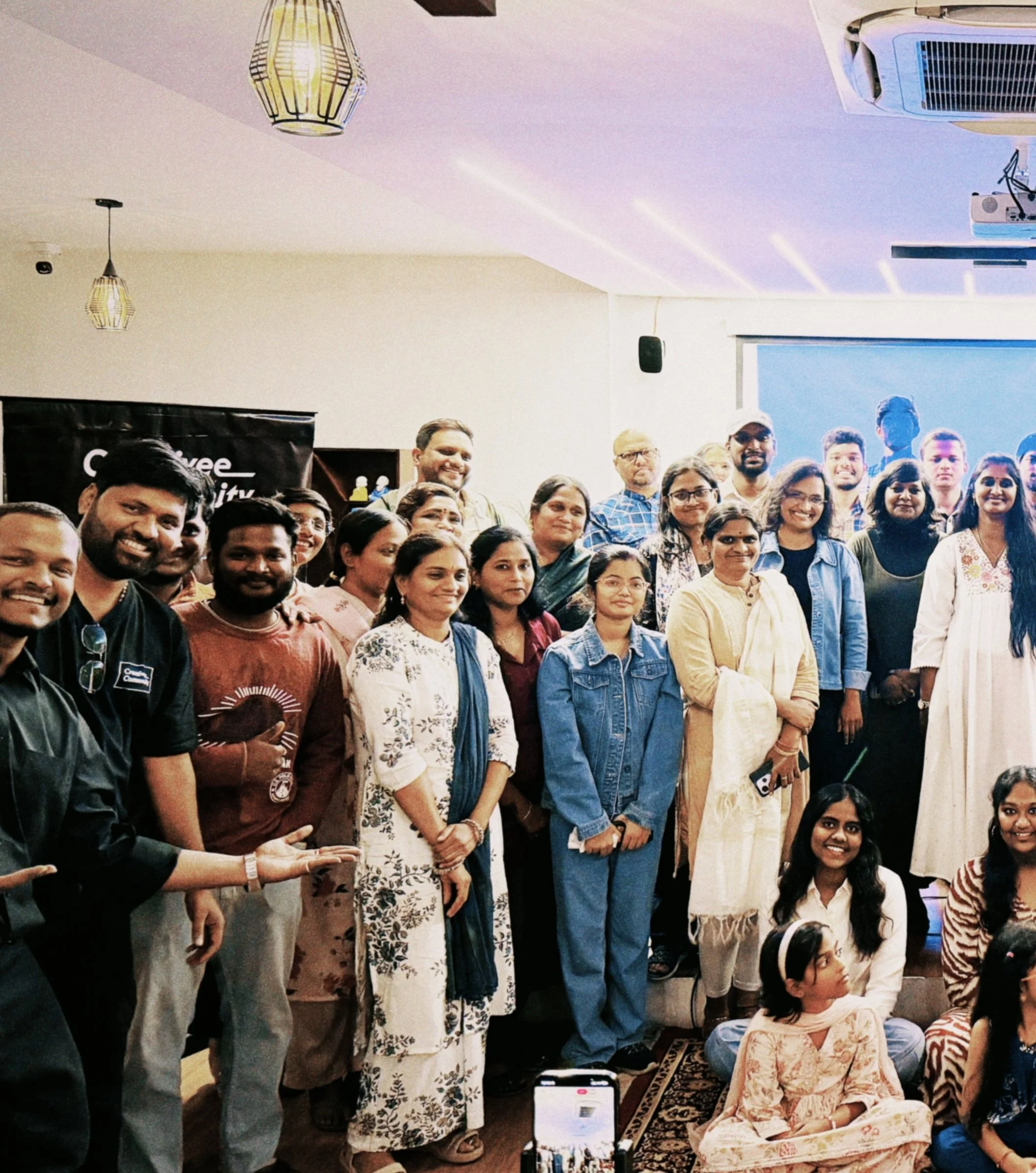Tejj with the Creativee design community he founded, global mentorship gathering